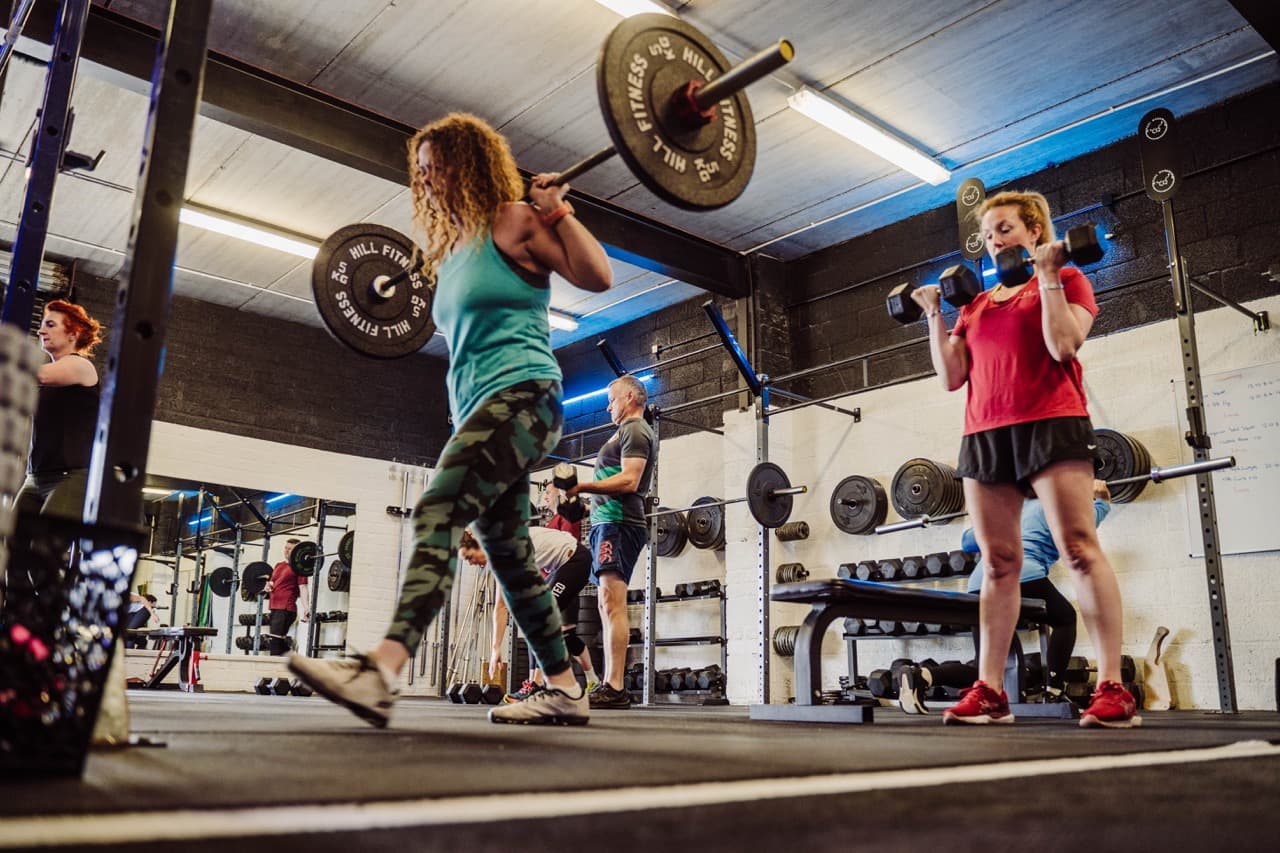 Members training together in a coached class at Paul McGowan Fitness